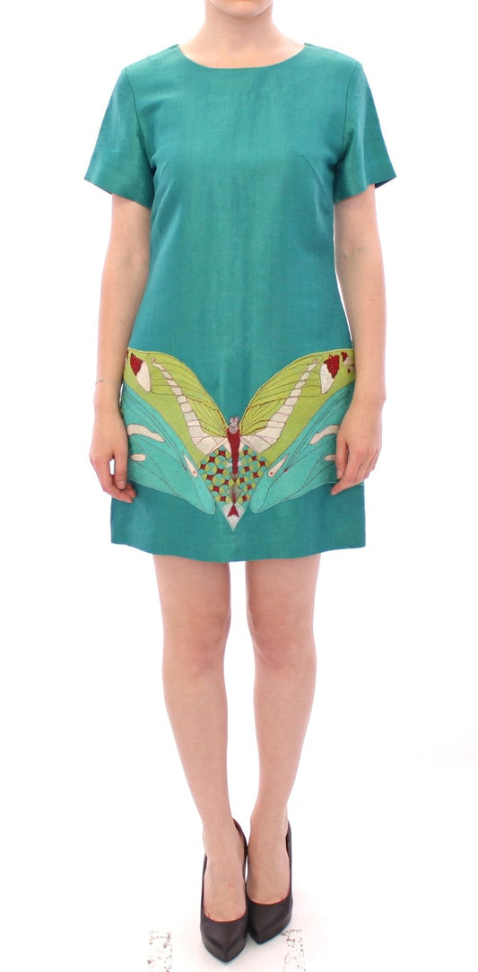 Elegantes besticktes grünes Minikleid