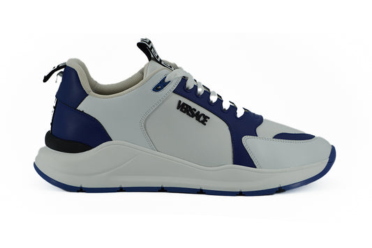 Elegantes zapatillas de piel en color azul y blanco