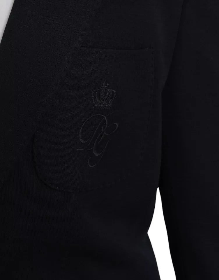 Blazer de lana azul con muescas y botonadura sencilla