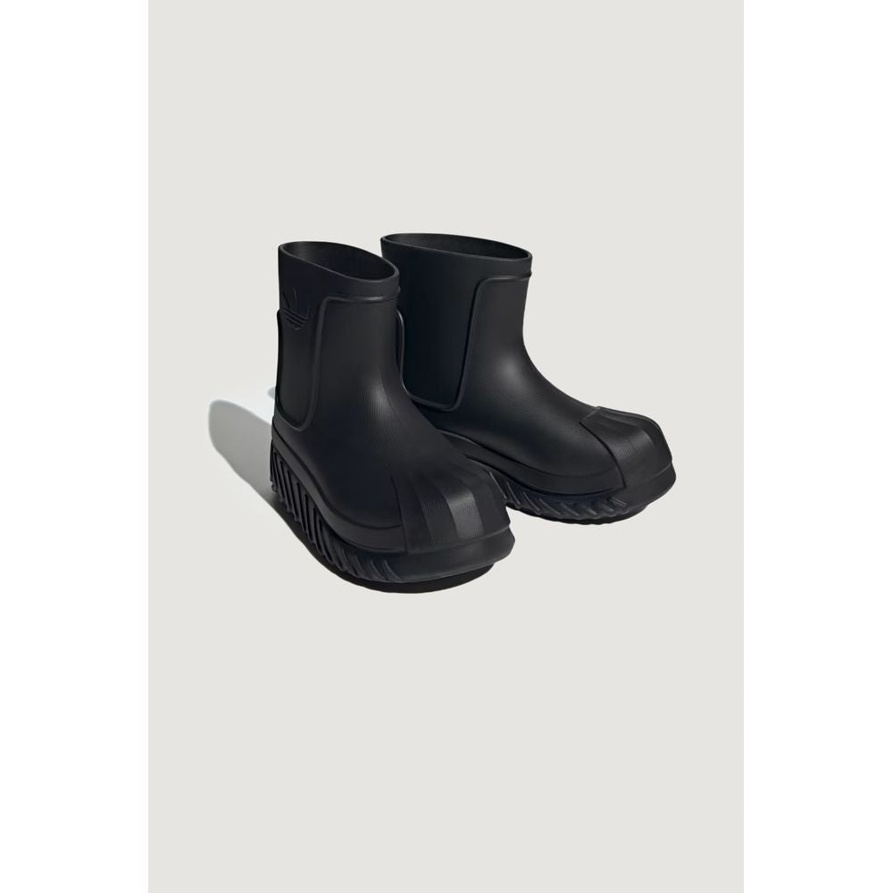 Bota de material sintético color negro