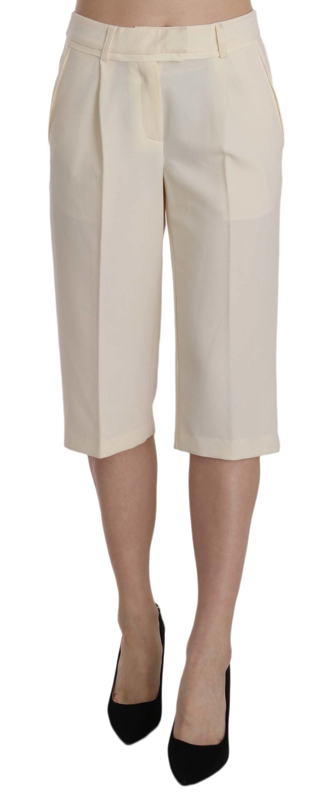 Pantalones rectos elegantes de corte crop en color crema