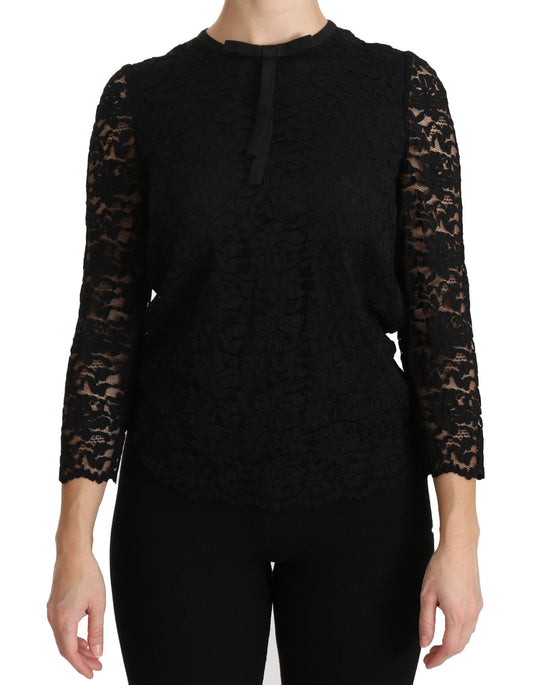 Elegante blusa de encaje negro con cuello redondo