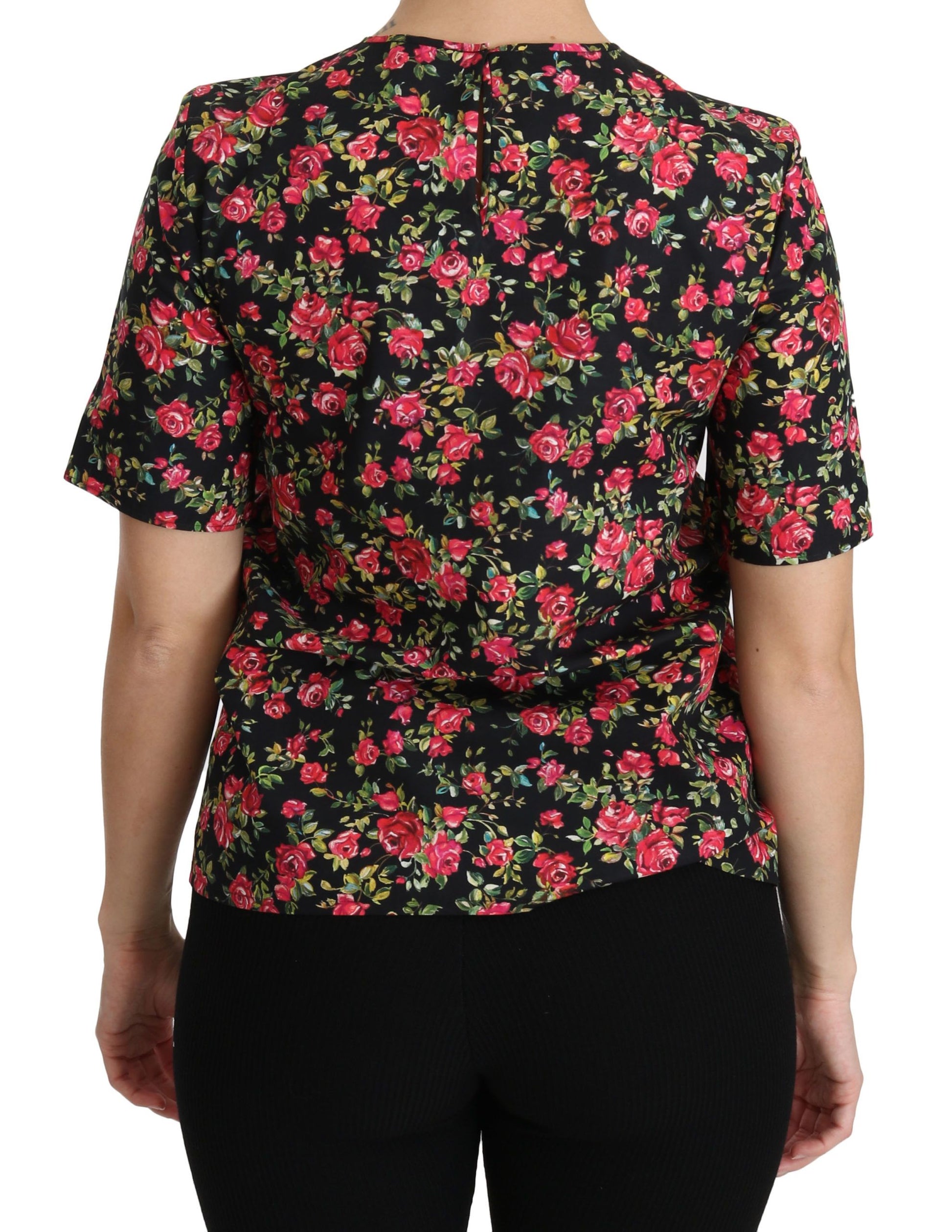 Elegante blusa de cuello redondo con estampado floral negro