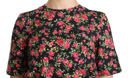 Elegante blusa de cuello redondo con estampado floral negro