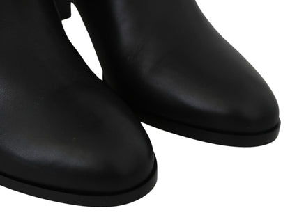 Botas elegantes de piel de becerro negra con tacón