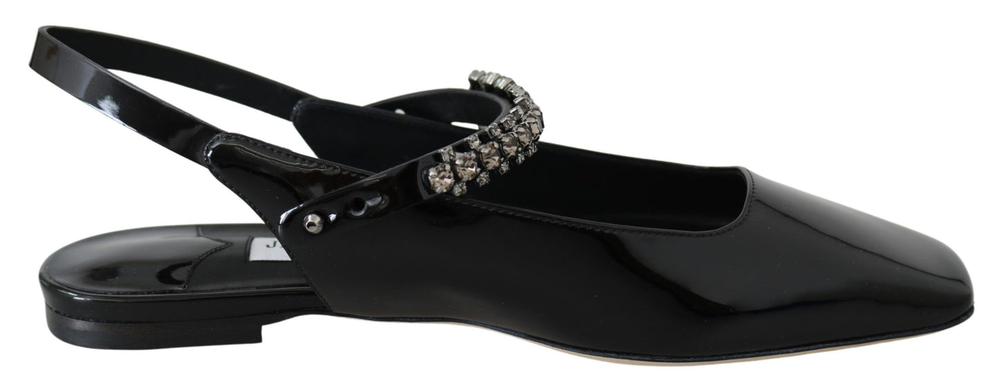 Elegantes zapatos planos de charol negro con detalles de cristal