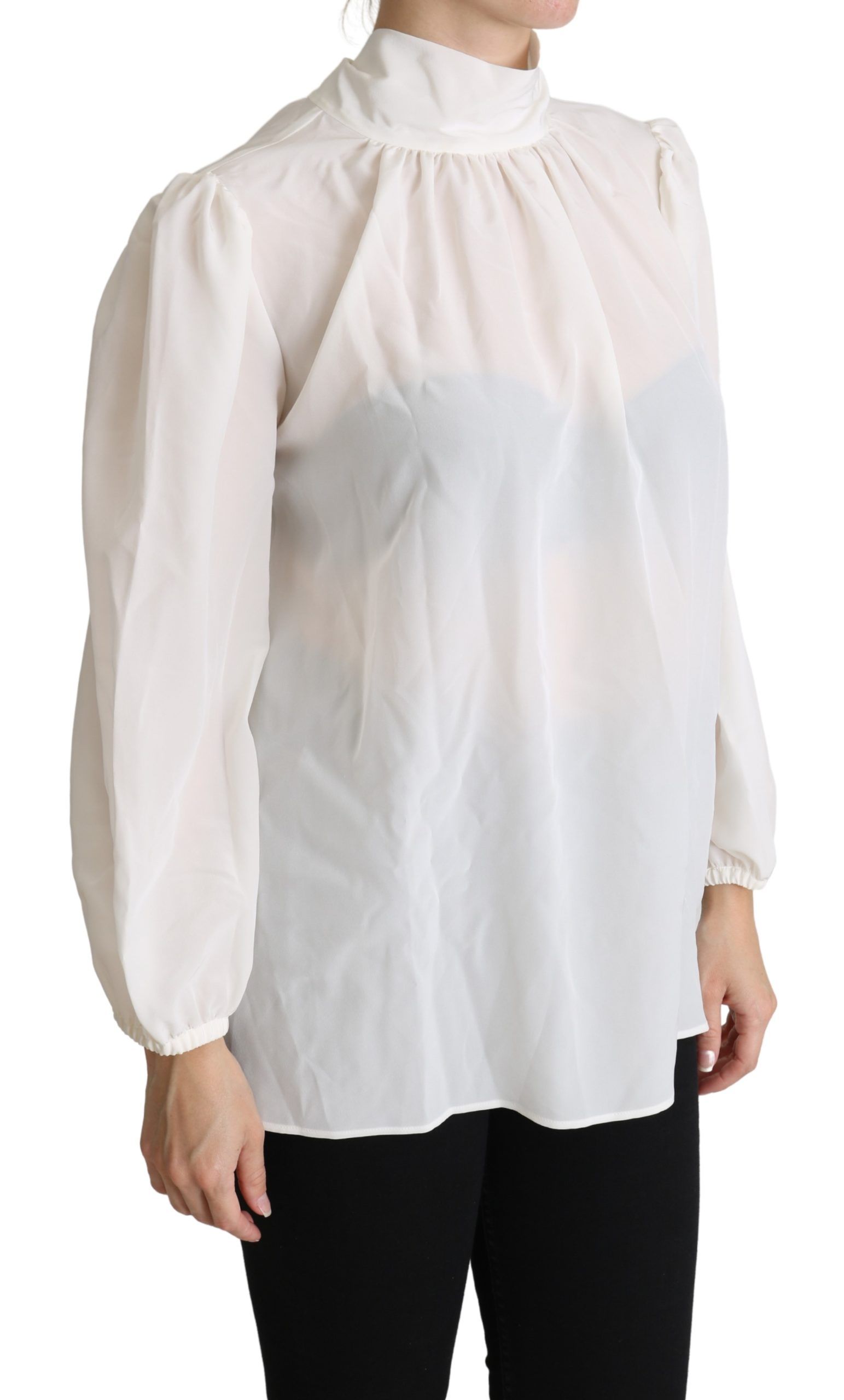 Elegante blusa de seda blanca con lazo en el cuello