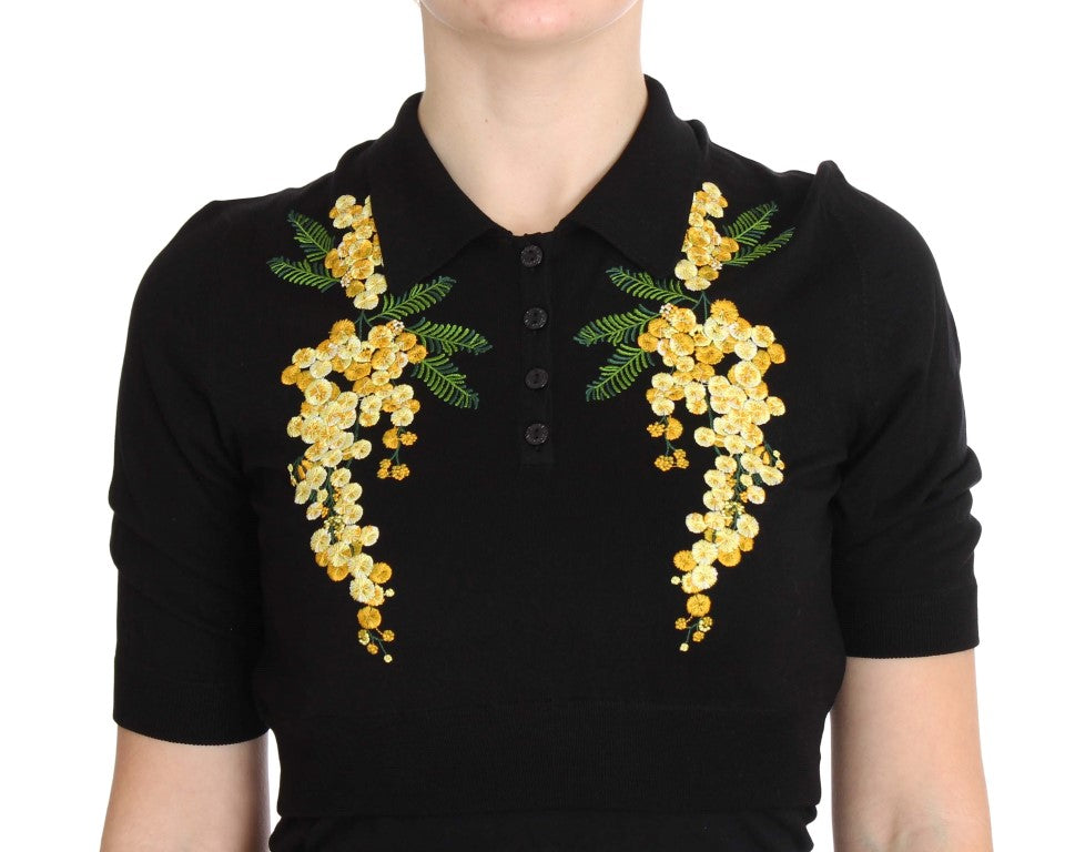 Elegante polo de seda negra con estampado floral