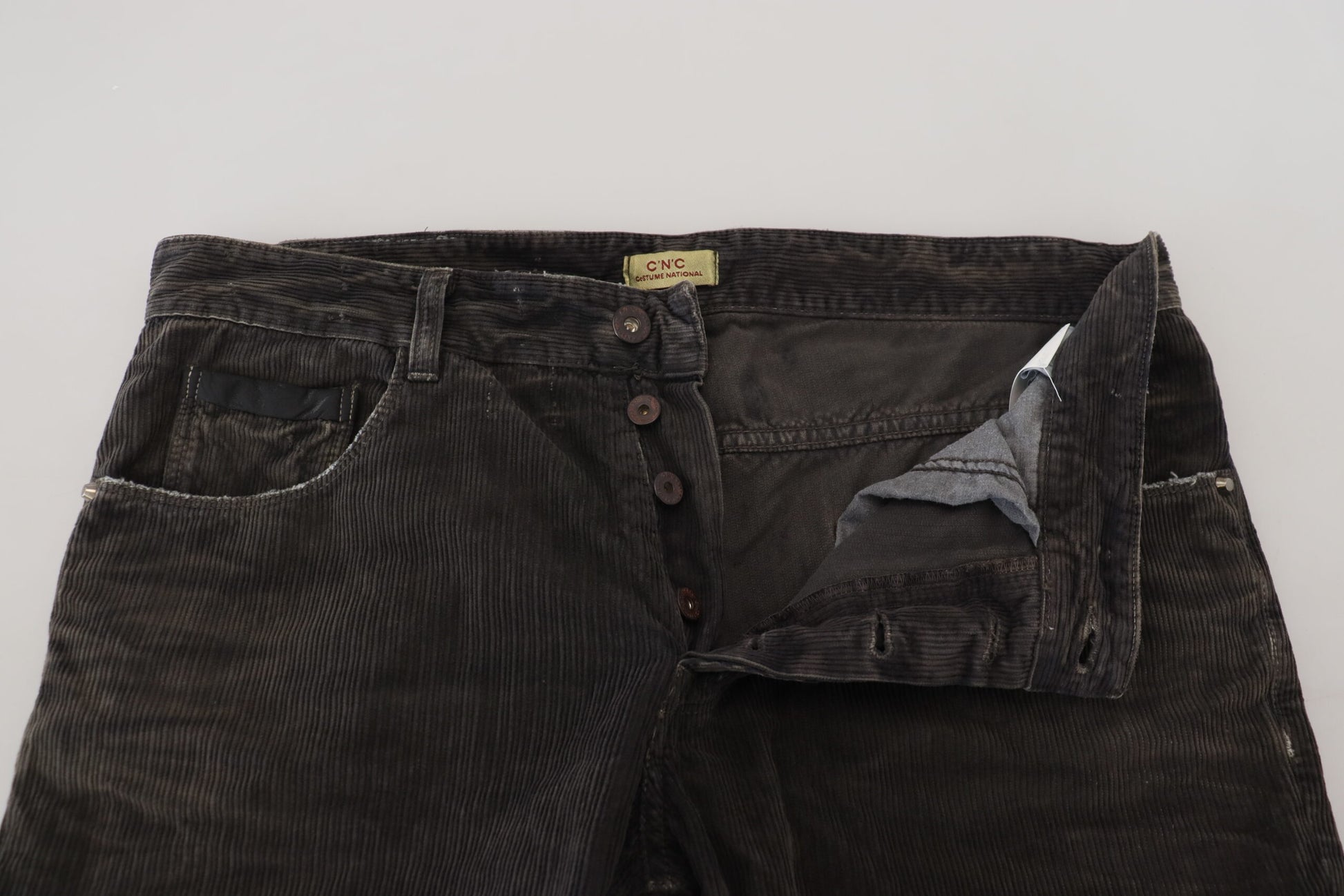 Elegantes jeans de pana gris