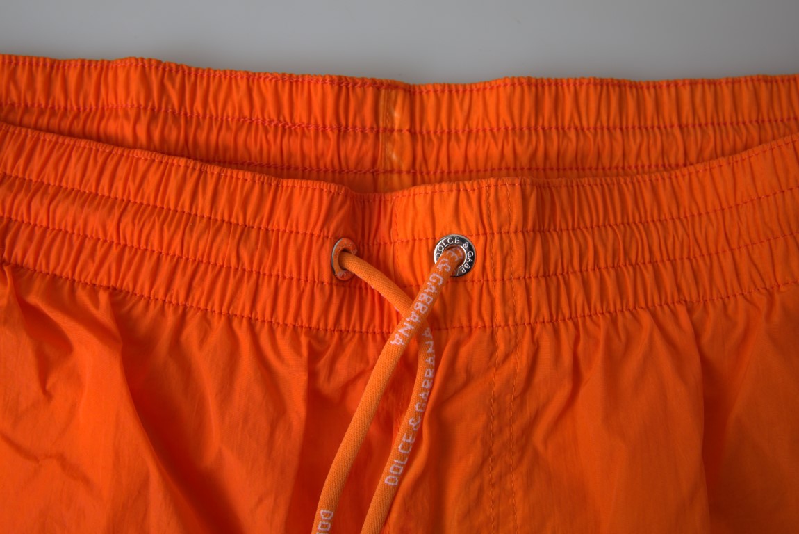 Badeshorts mit Farbverlaufseffekt in leuchtendem Orange