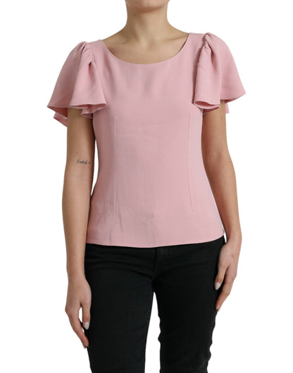 Blusa elegante con mangas acampanadas en color rosa