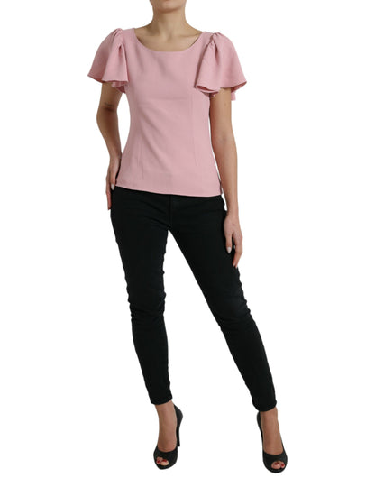 Blusa elegante con mangas acampanadas en color rosa