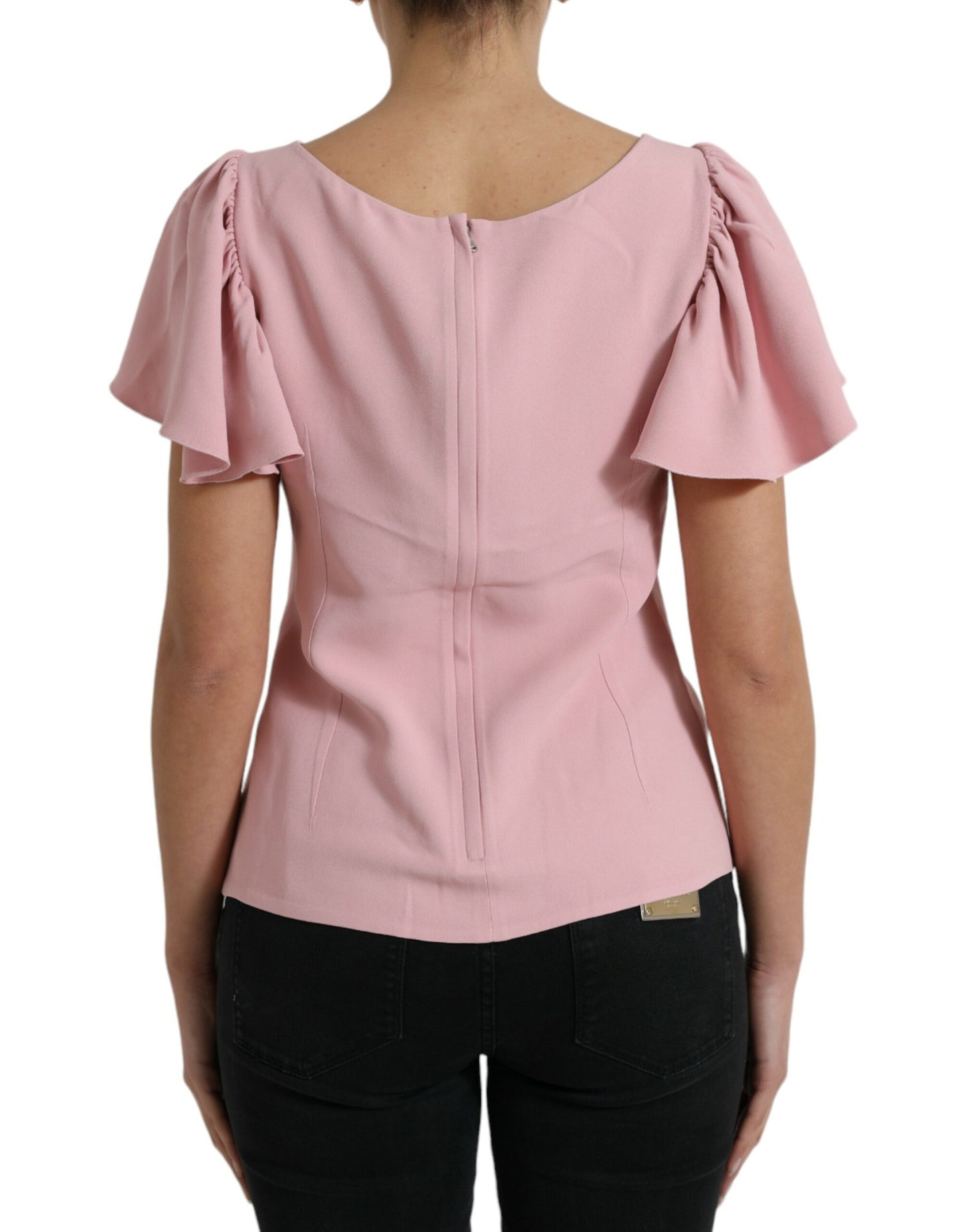 Blusa elegante con mangas acampanadas en color rosa