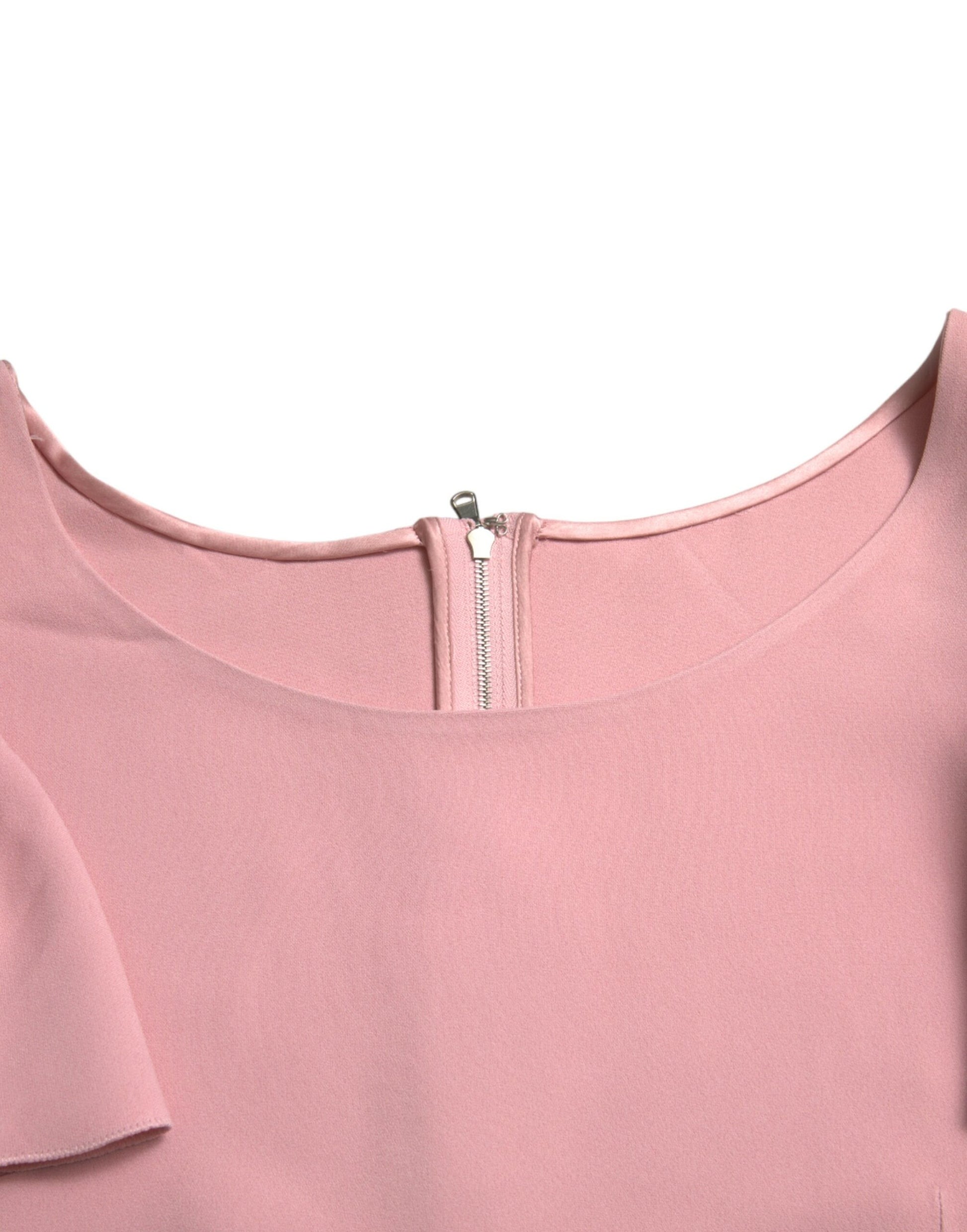 Blusa elegante con mangas acampanadas en color rosa