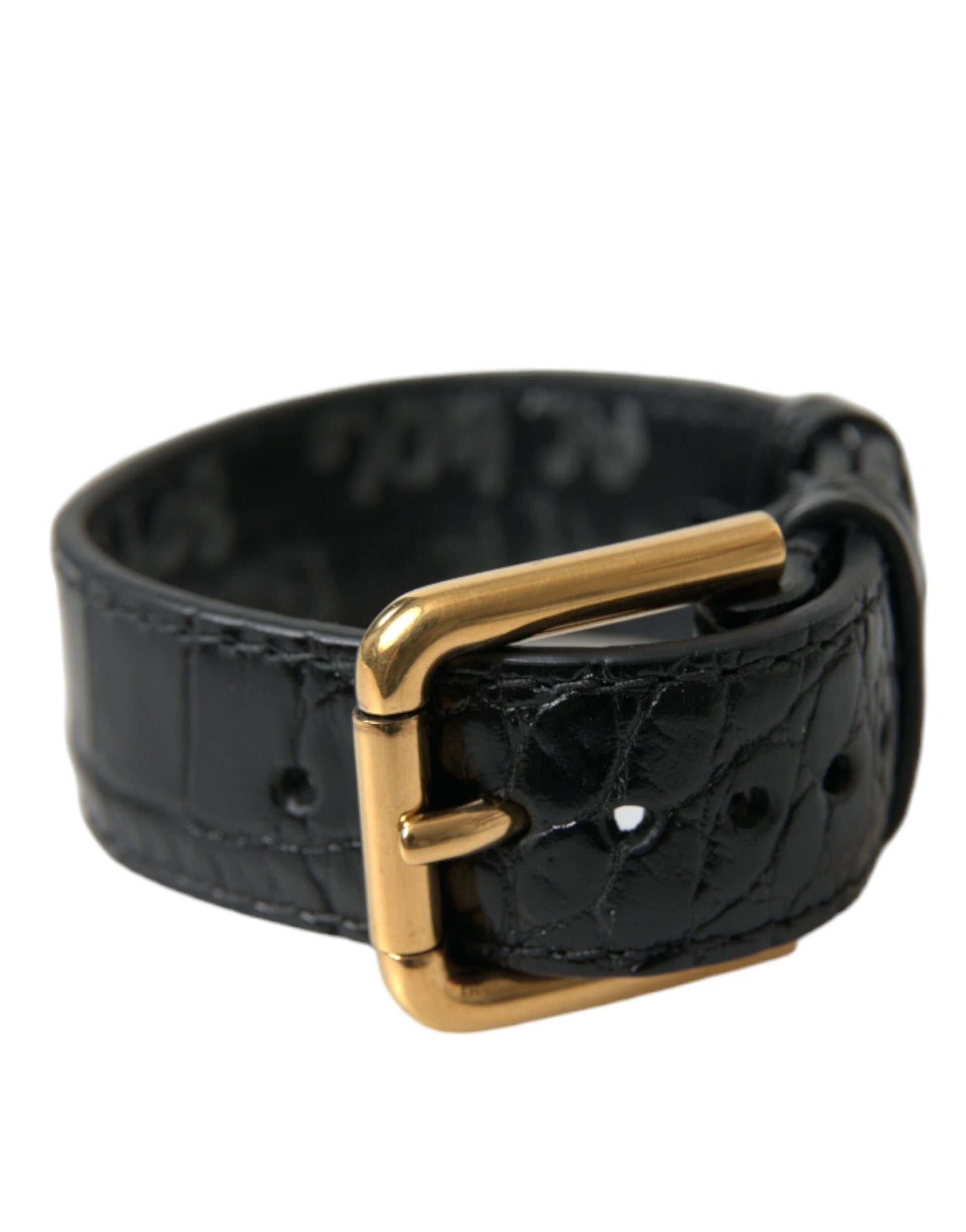 Elegante pulsera de cuero negro y dorado