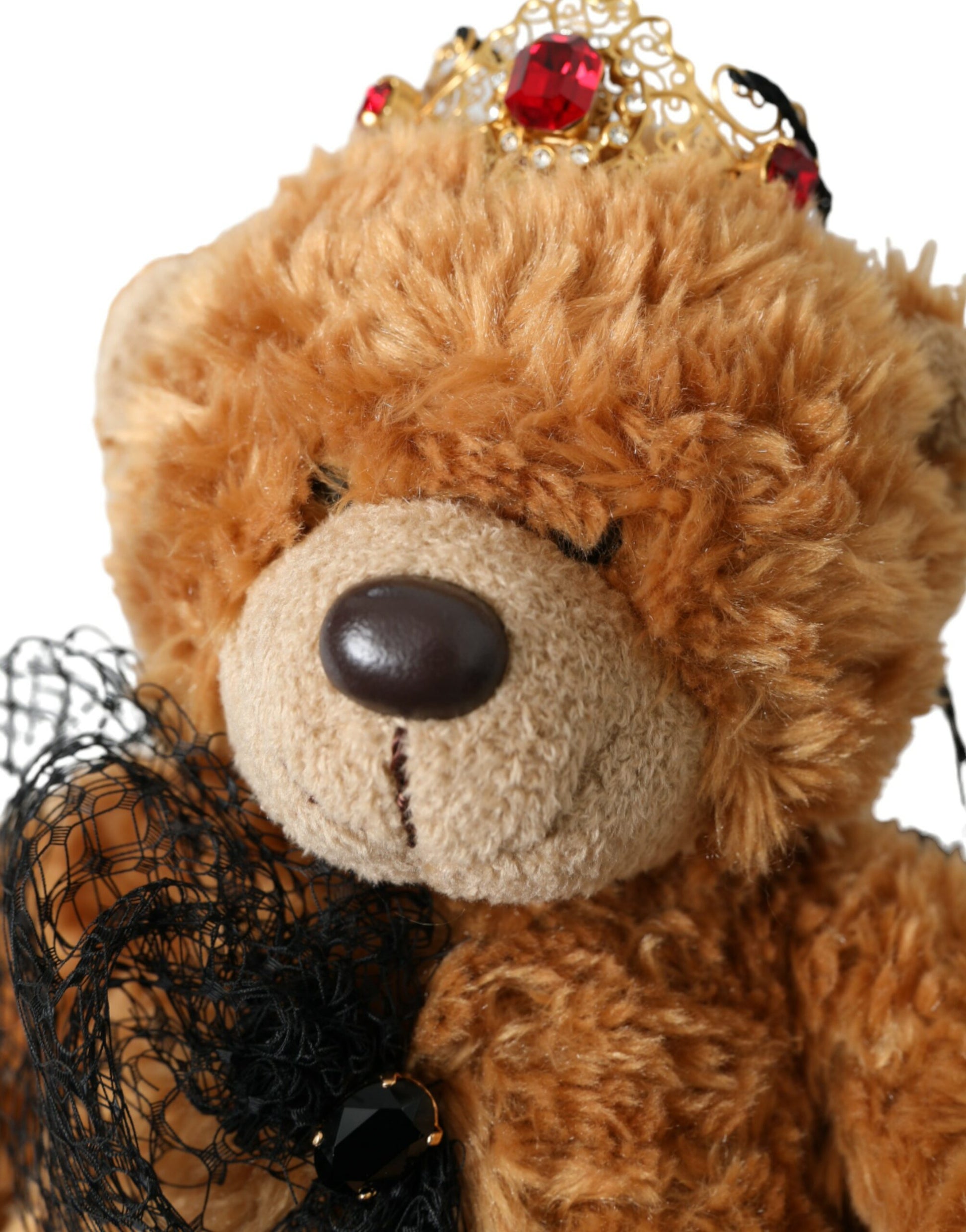 Brauner Teddybär mit goldener Kristallkrone und Diadem