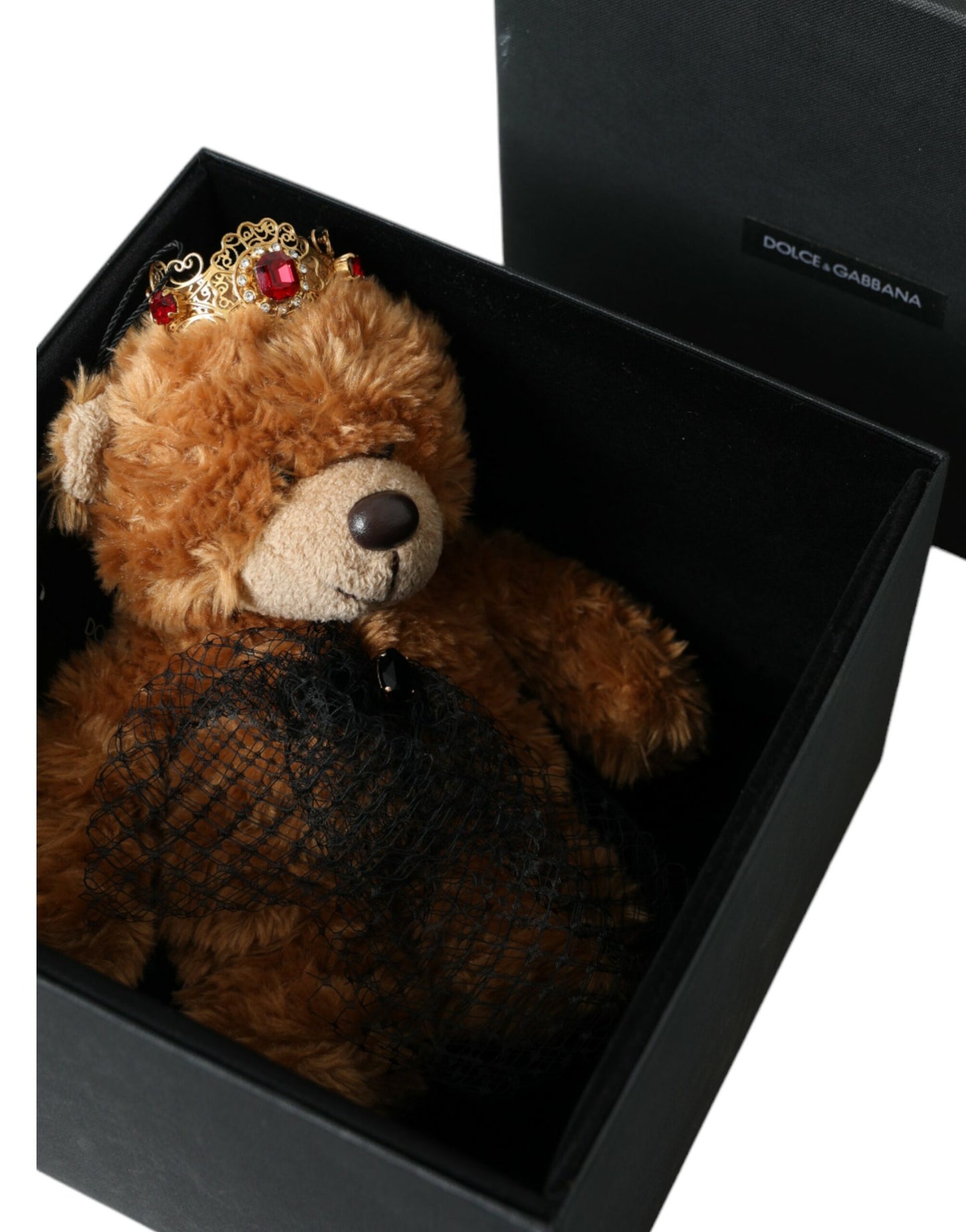 Brauner Teddybär mit goldener Kristallkrone und Diadem