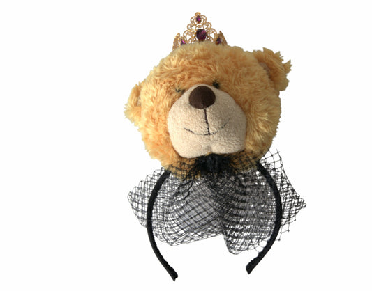 Brauner Teddybär mit goldener Kristallkrone und Diadem