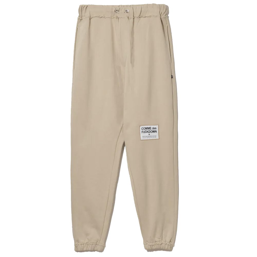 Pantalones deportivos elegantes de algodón beige con detalles deshilachados