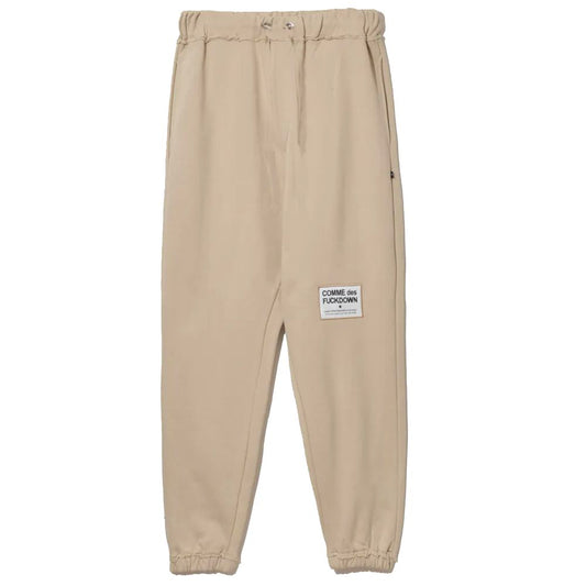 Pantalones deportivos elegantes de algodón beige con detalles deshilachados