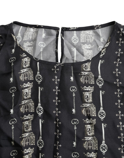 Blusa de seda con estampado de castillo y llave negra