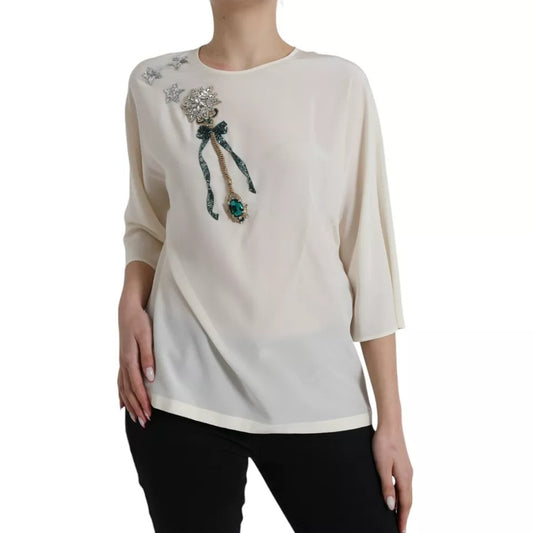 Blusa de seda blanca con mangas 3/4 y cristales