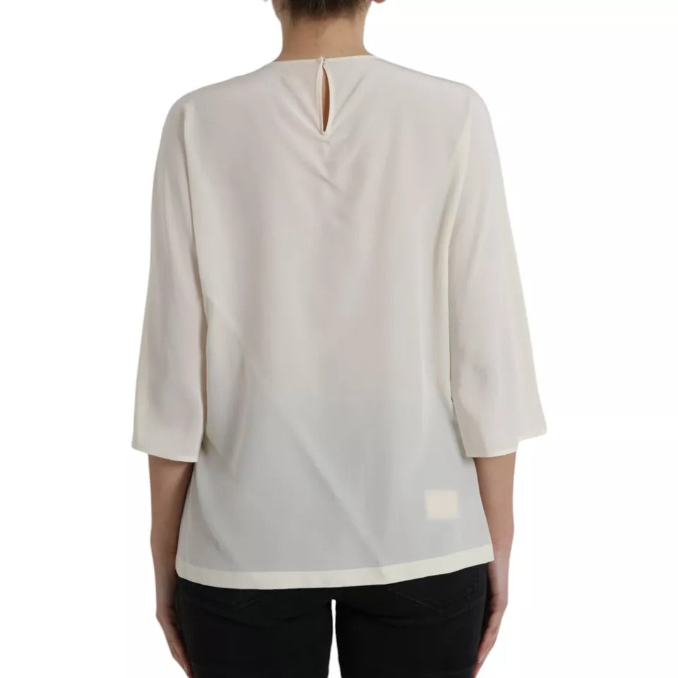 Blusa de seda blanca con mangas 3/4 y cristales