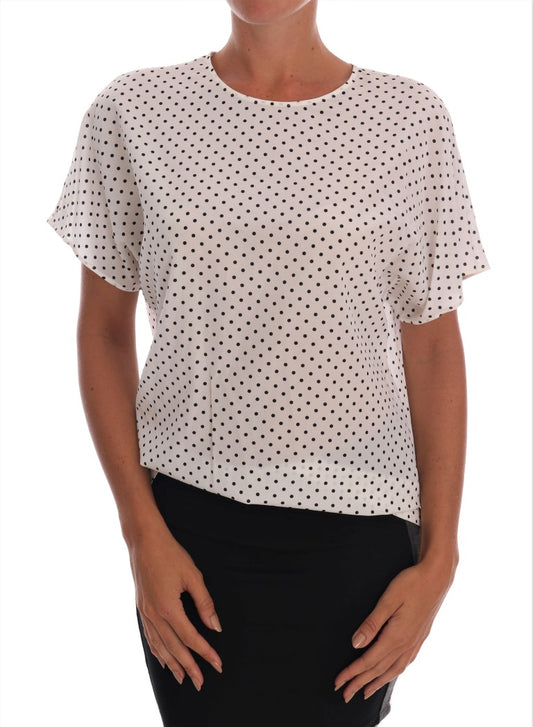 Blusa elegante de seda con lunares