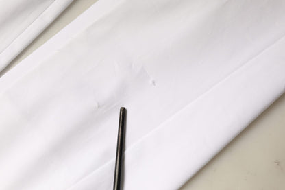 Vaqueros de talle medio de algodón blanco con corte cónico