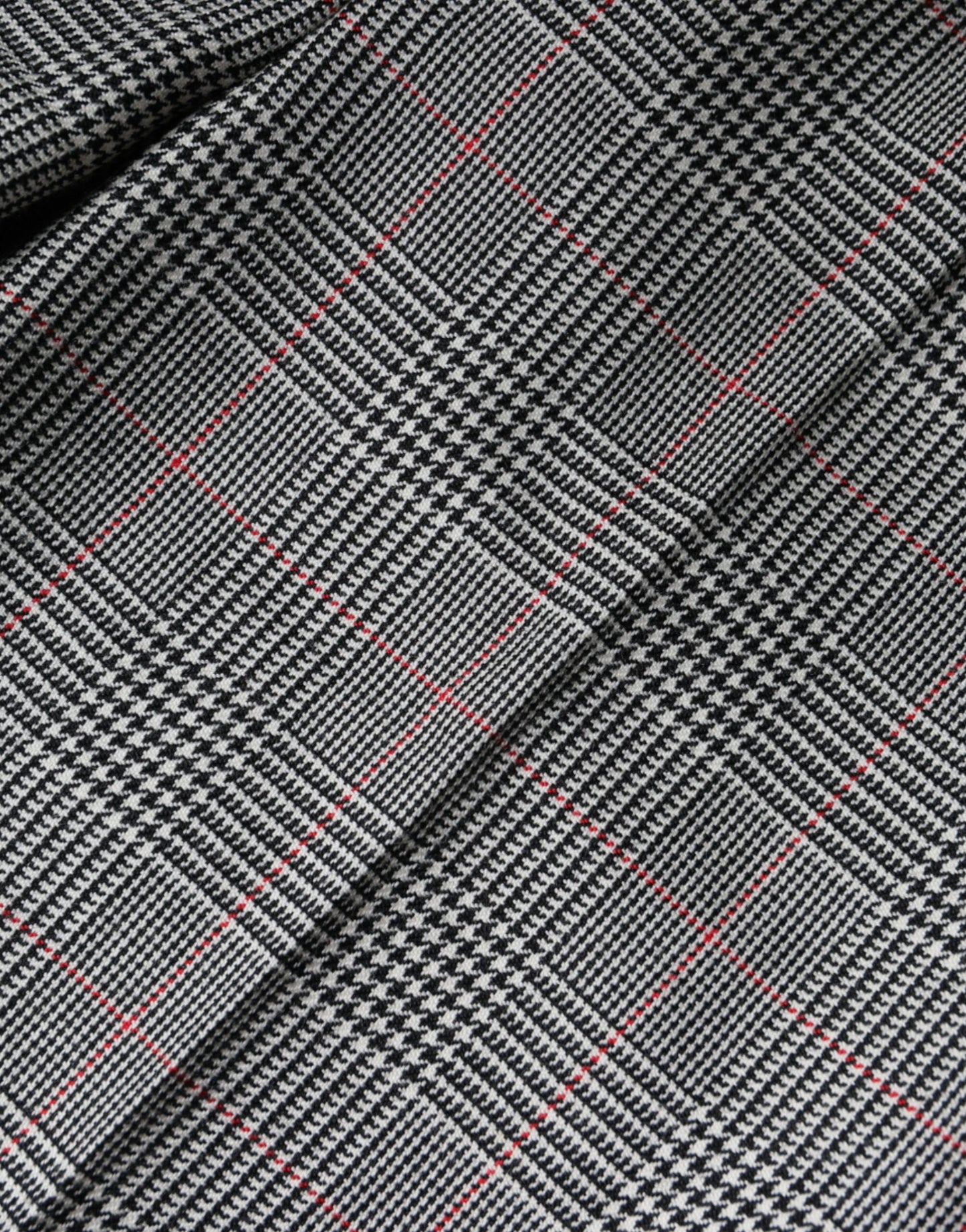 Pantalones cónicos de cintura media de lana a cuadros grises para mujer