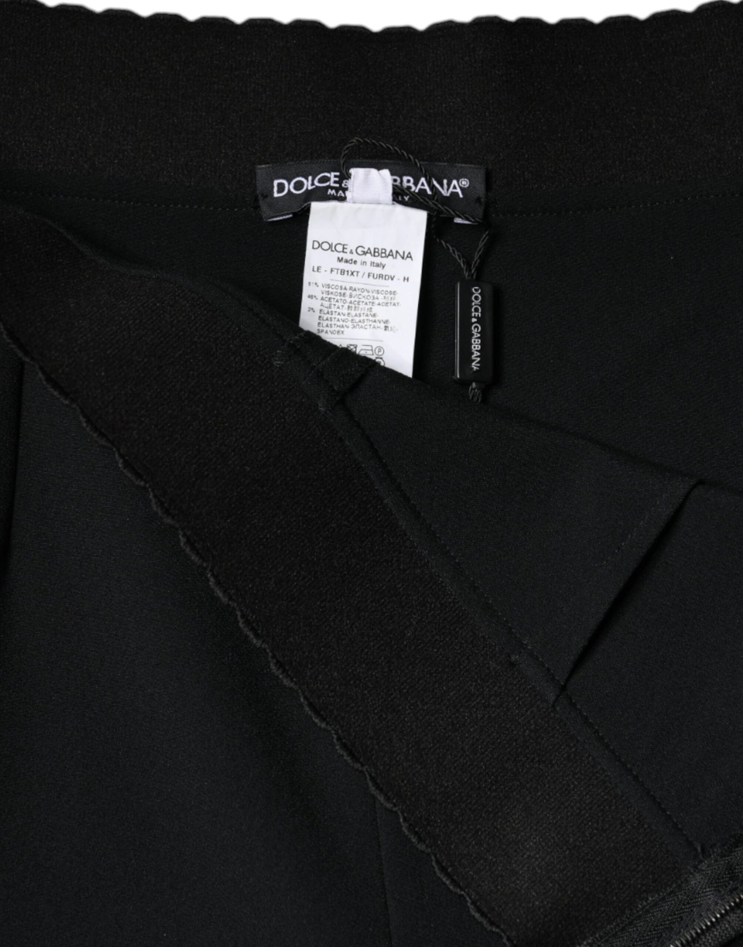 Pantalones negros de viscosa con cintura alta y corte cónico