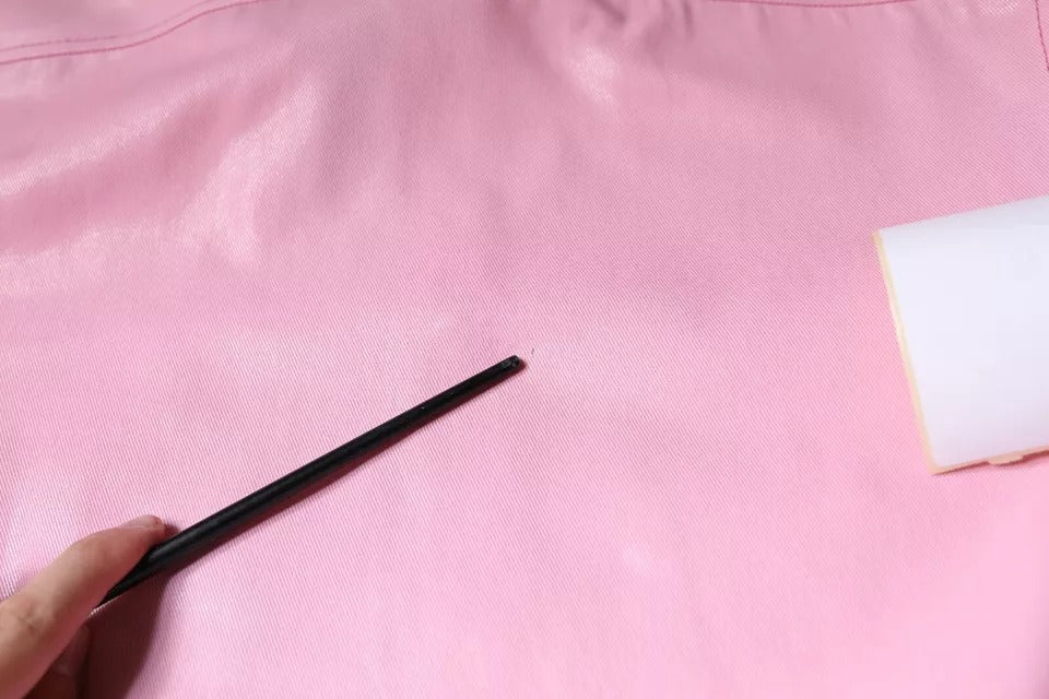 Camisa de algodón con cuello y botones en color rosa