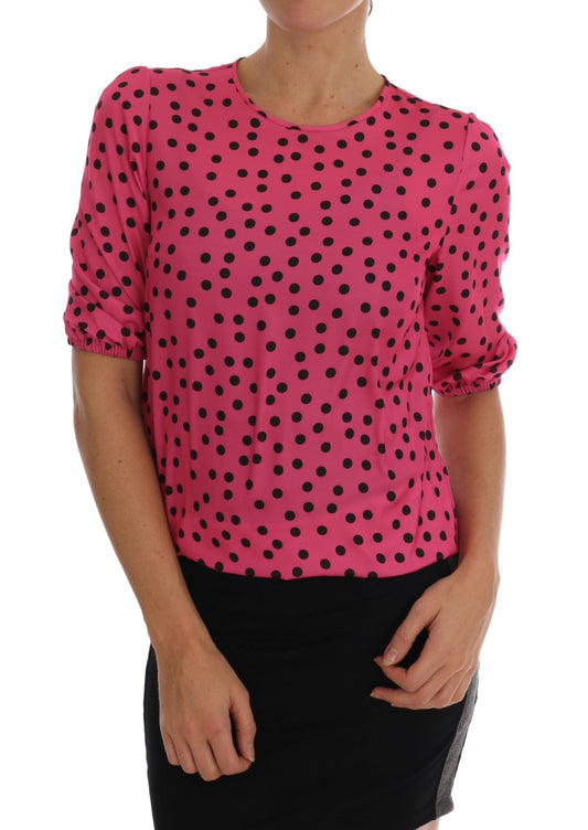 Blusa elegante de seda con lunares rosas