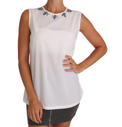 Elegante blusa de seda sin mangas adornada