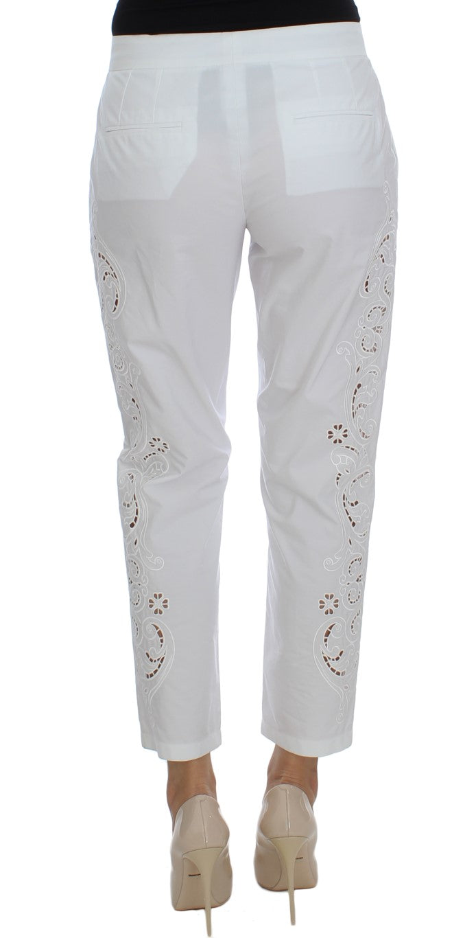 Pantalones de vestir elegantes con aberturas florales en color blanco