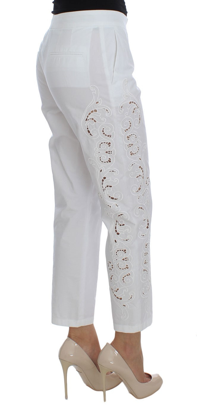 Pantalones de vestir elegantes con aberturas florales en color blanco