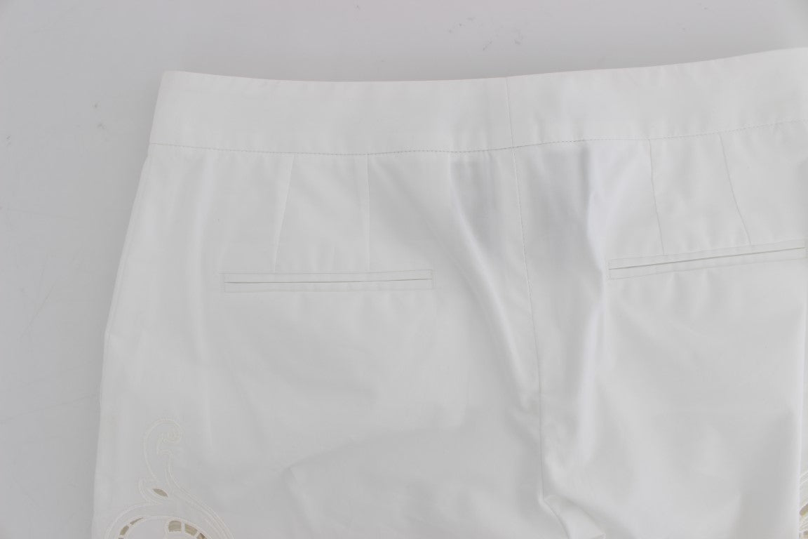 Pantalones de vestir elegantes con aberturas florales en color blanco