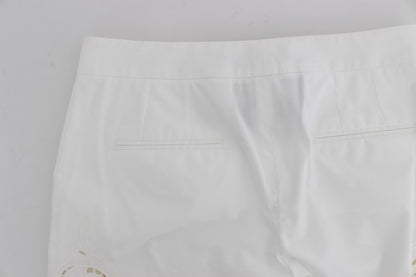 Pantalones de vestir elegantes con aberturas florales en color blanco