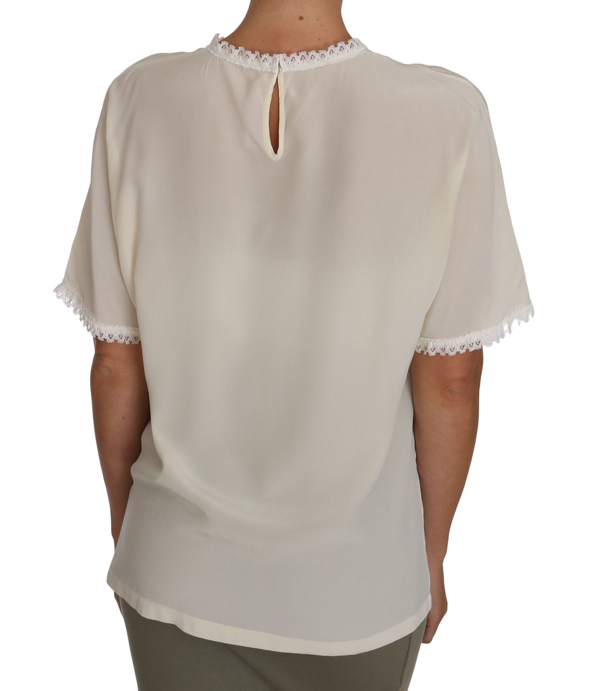 Blusa de seda color crema con detalles de encaje